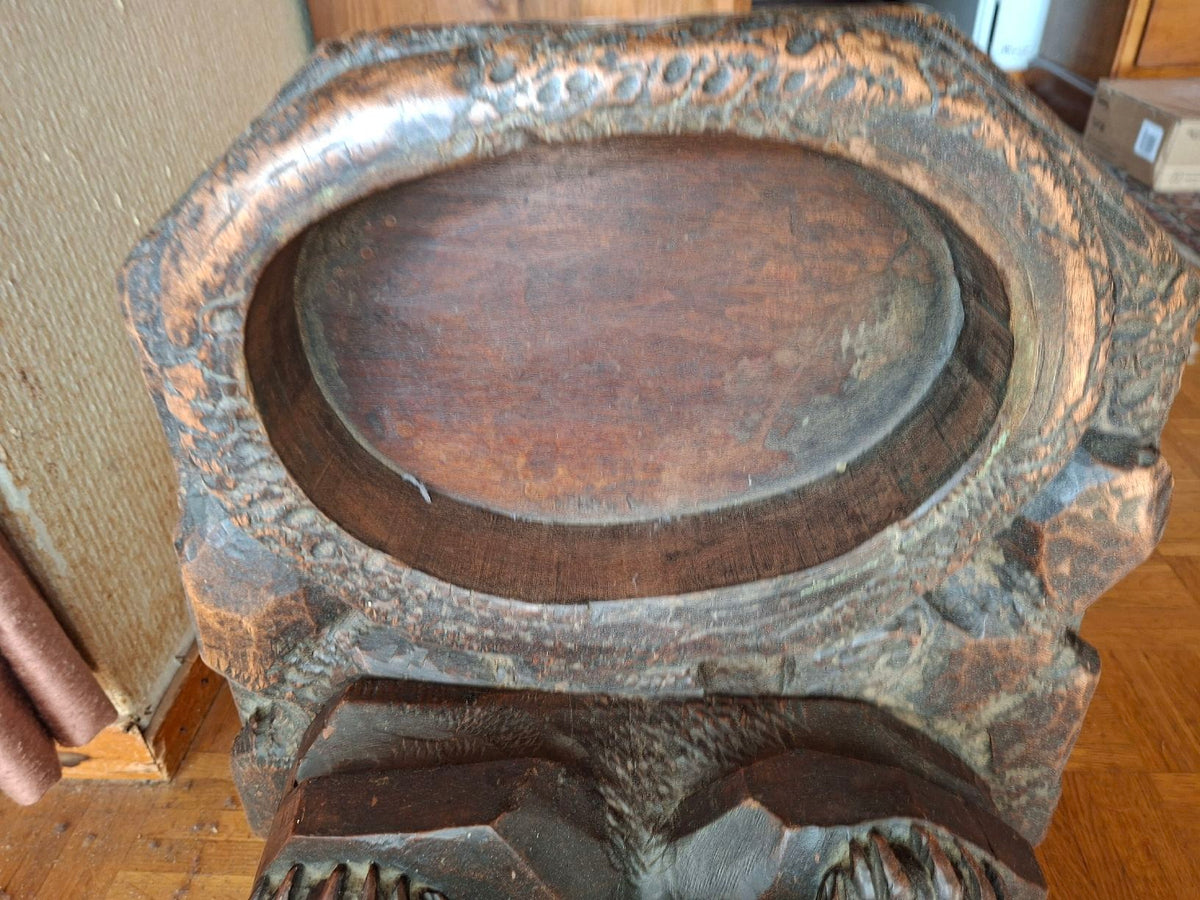 Antique wooden bear sculpture