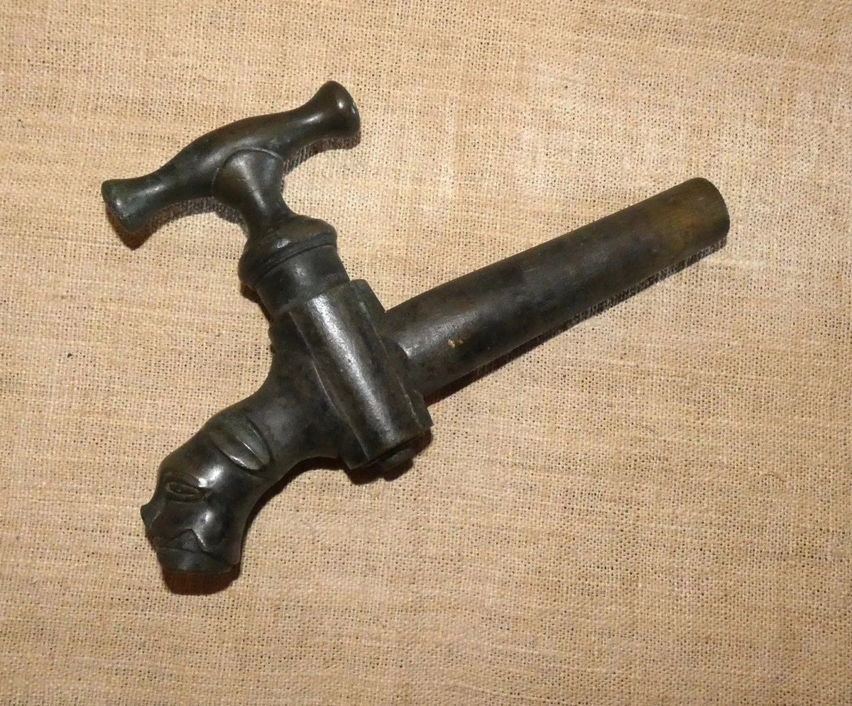 antique zoomorphic bronze tap