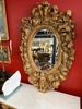 Very beautiful mirror that features Louis XV style characteristics.