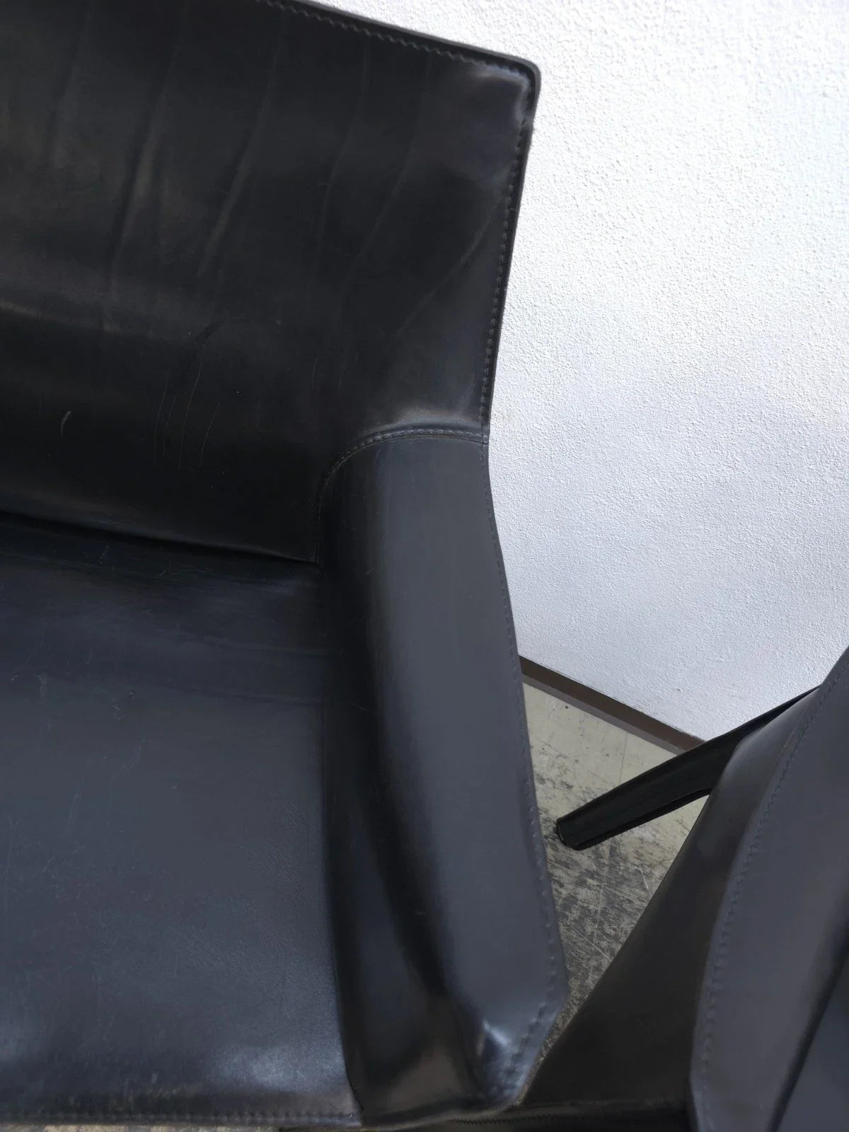 The Cab 413 chair by Cassina, a masterpiece of Italian design