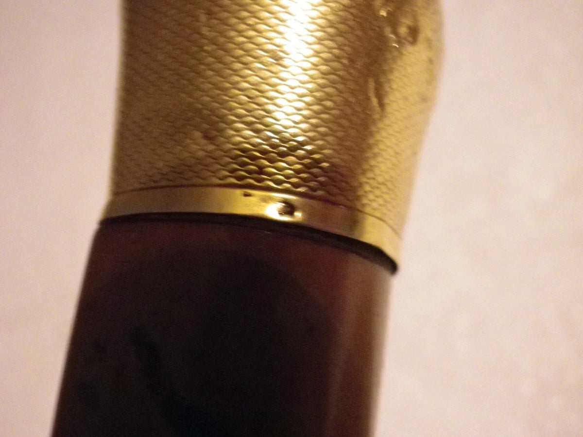 Antique cane with 18k gold pommel, eagle's head hallmark