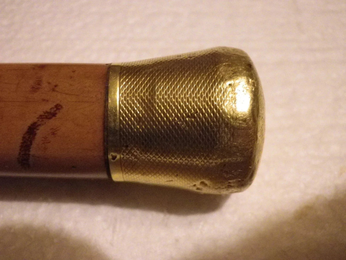 Antique cane with 18k gold pommel, eagle's head hallmark