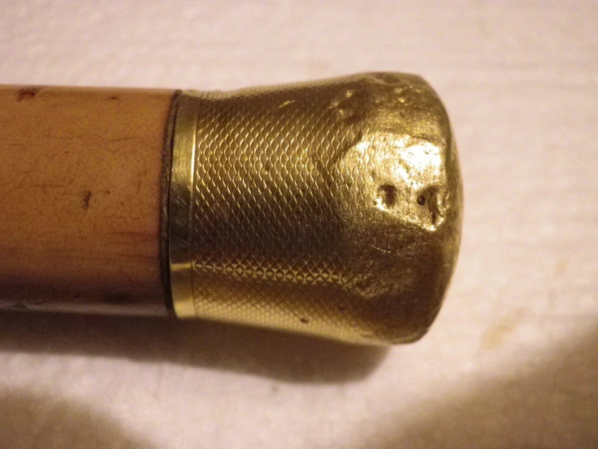Antique cane with 18k gold pommel, eagle's head hallmark