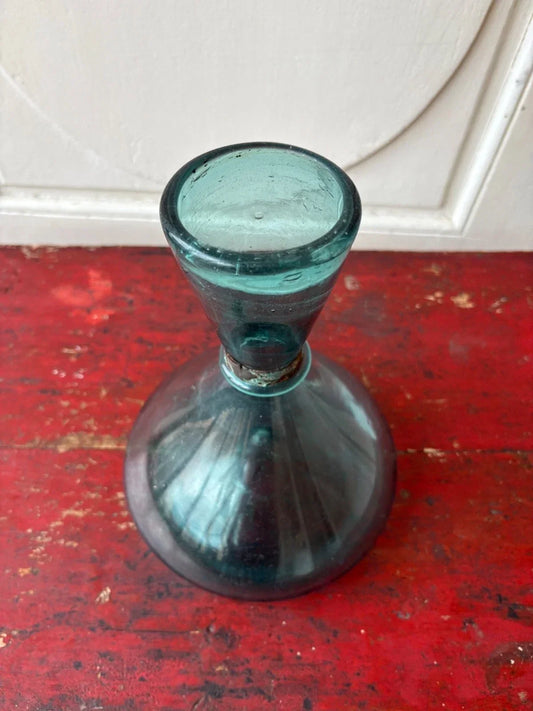 Antique blown glass measuring bottle