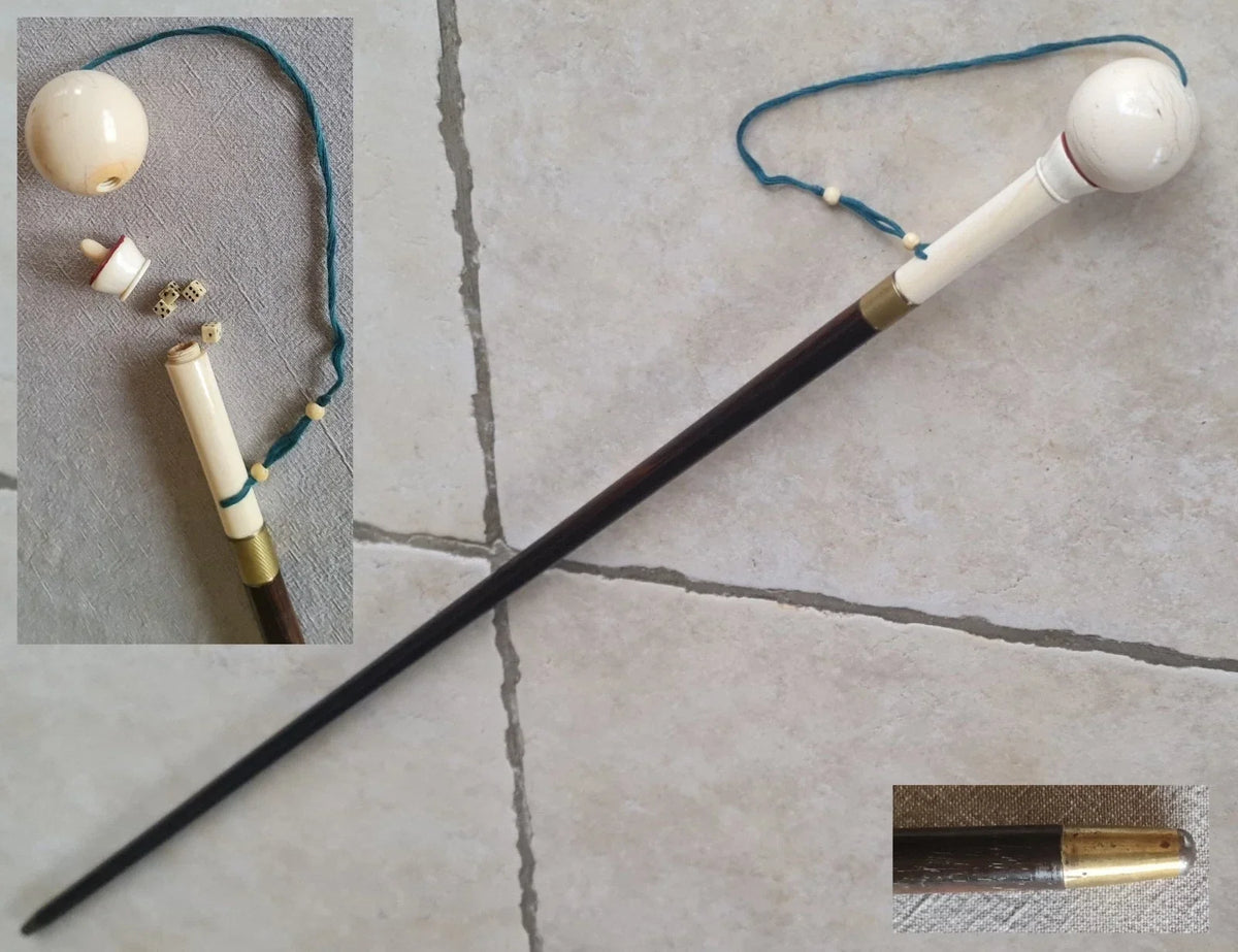 Cup-and-ball game cane