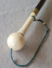 Cup-and-ball game cane
