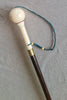 Cup-and-ball game cane