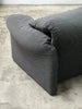 2-seater sofa with a sleek design by Enzo Magistretti for Cassina.