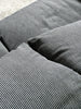2-seater sofa with a sleek design by Enzo Magistretti for Cassina.