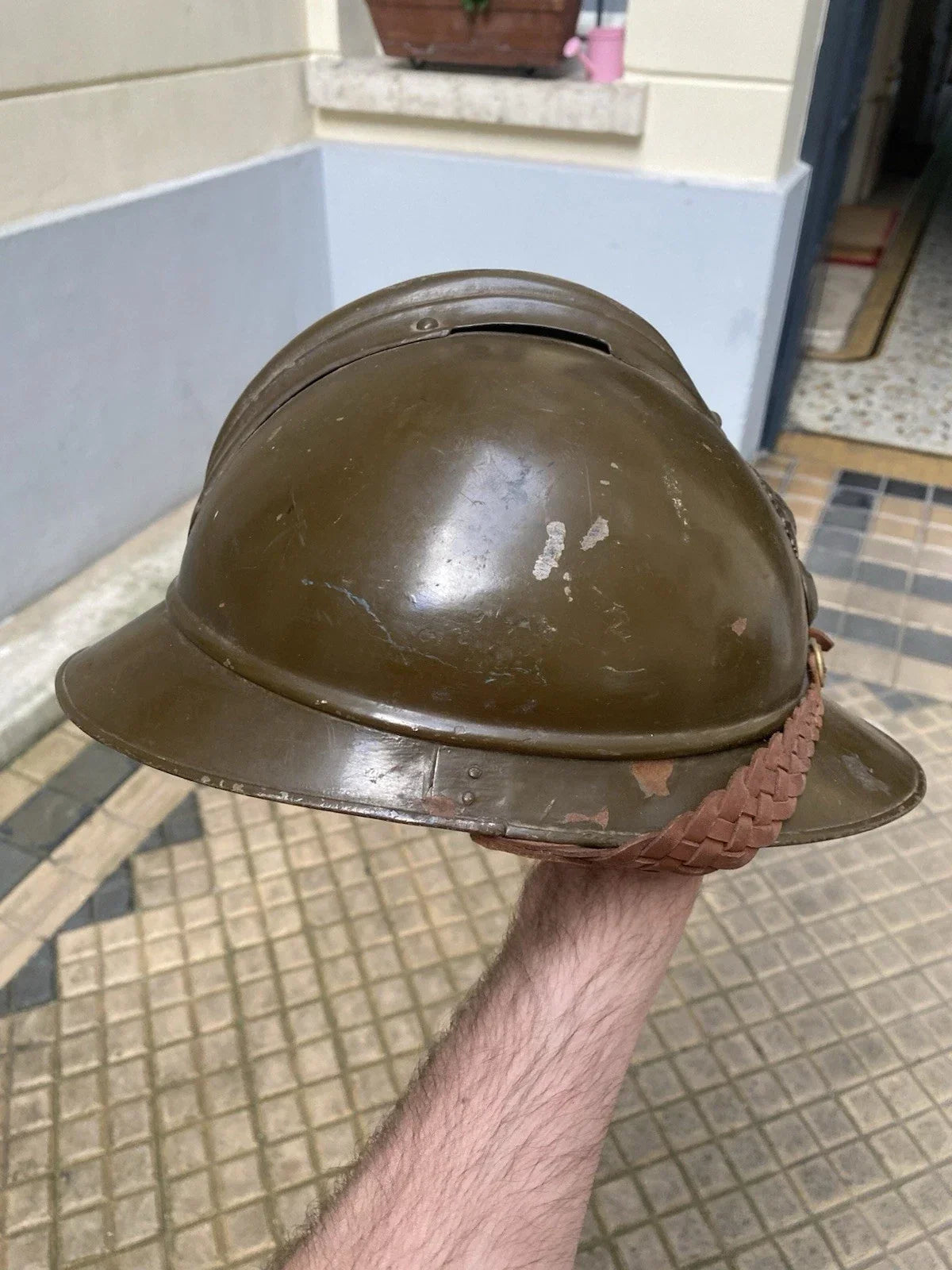 Original mustard-colored Model 15 Adrian helmet