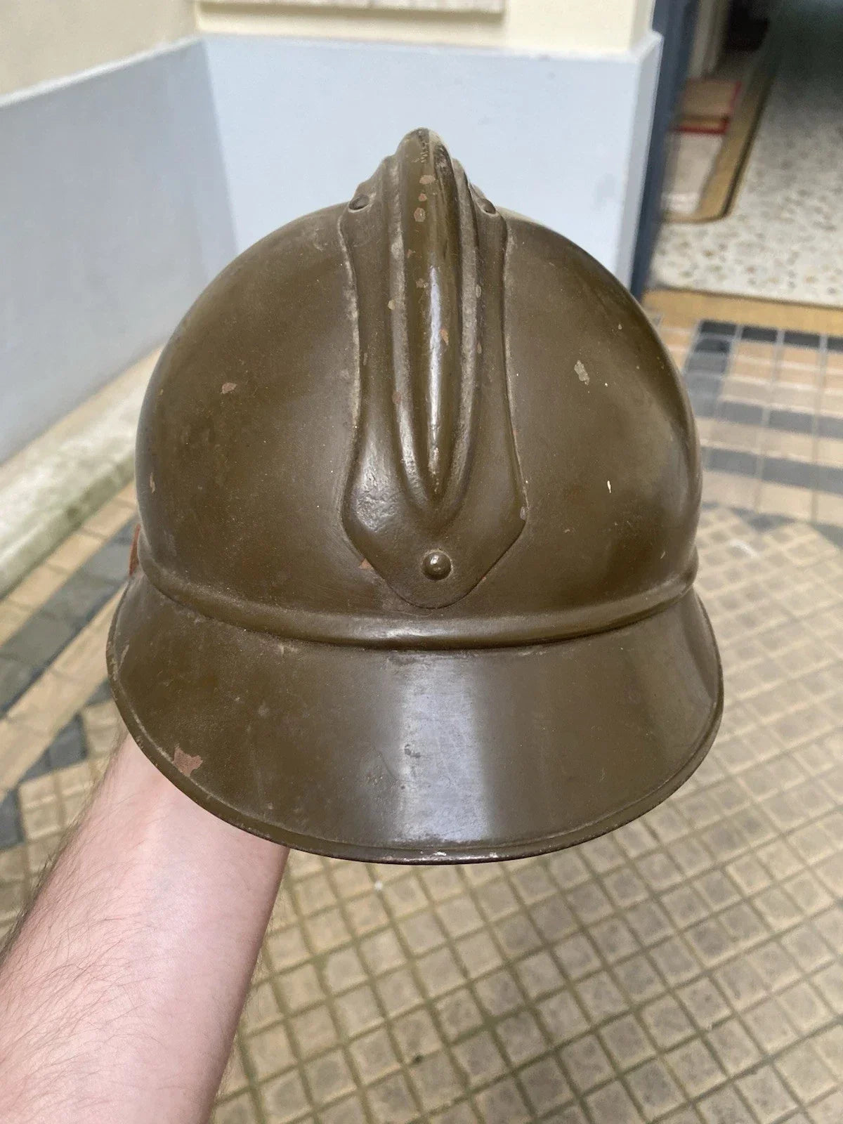 Original mustard-colored Model 15 Adrian helmet