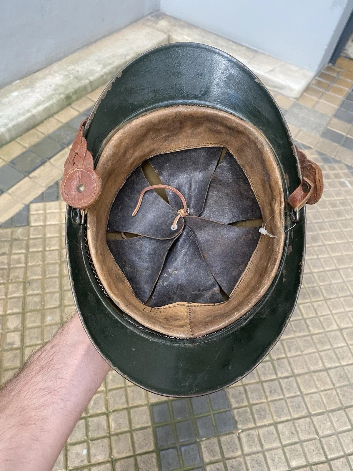 Original mustard-colored Model 15 Adrian helmet