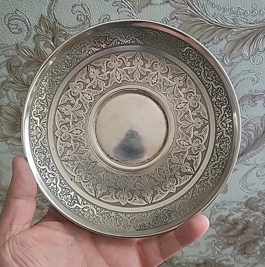 Solid silver cup and saucer