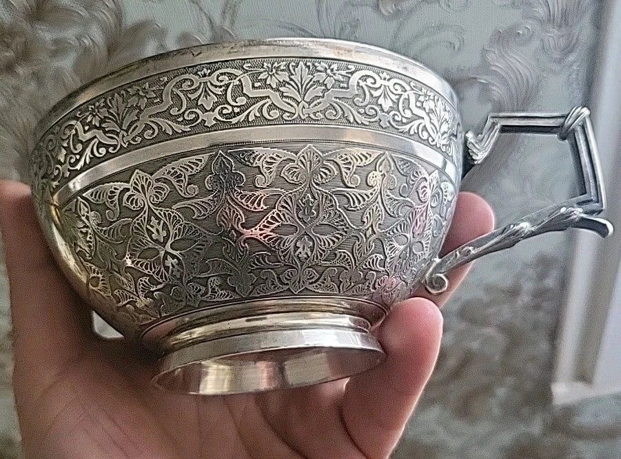 Solid silver cup and saucer