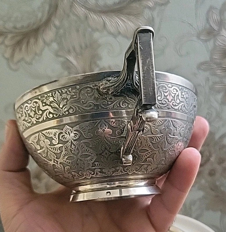 Solid silver cup and saucer
