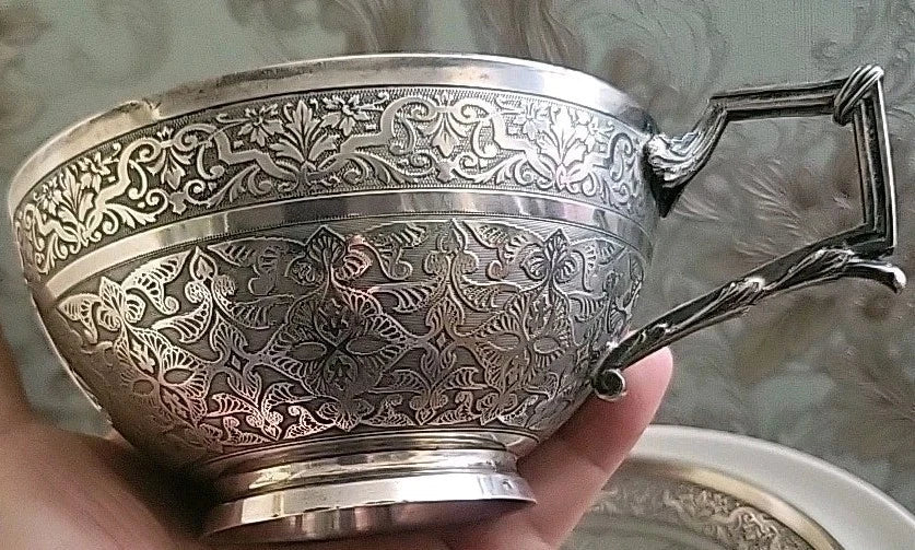 Solid silver cup and saucer