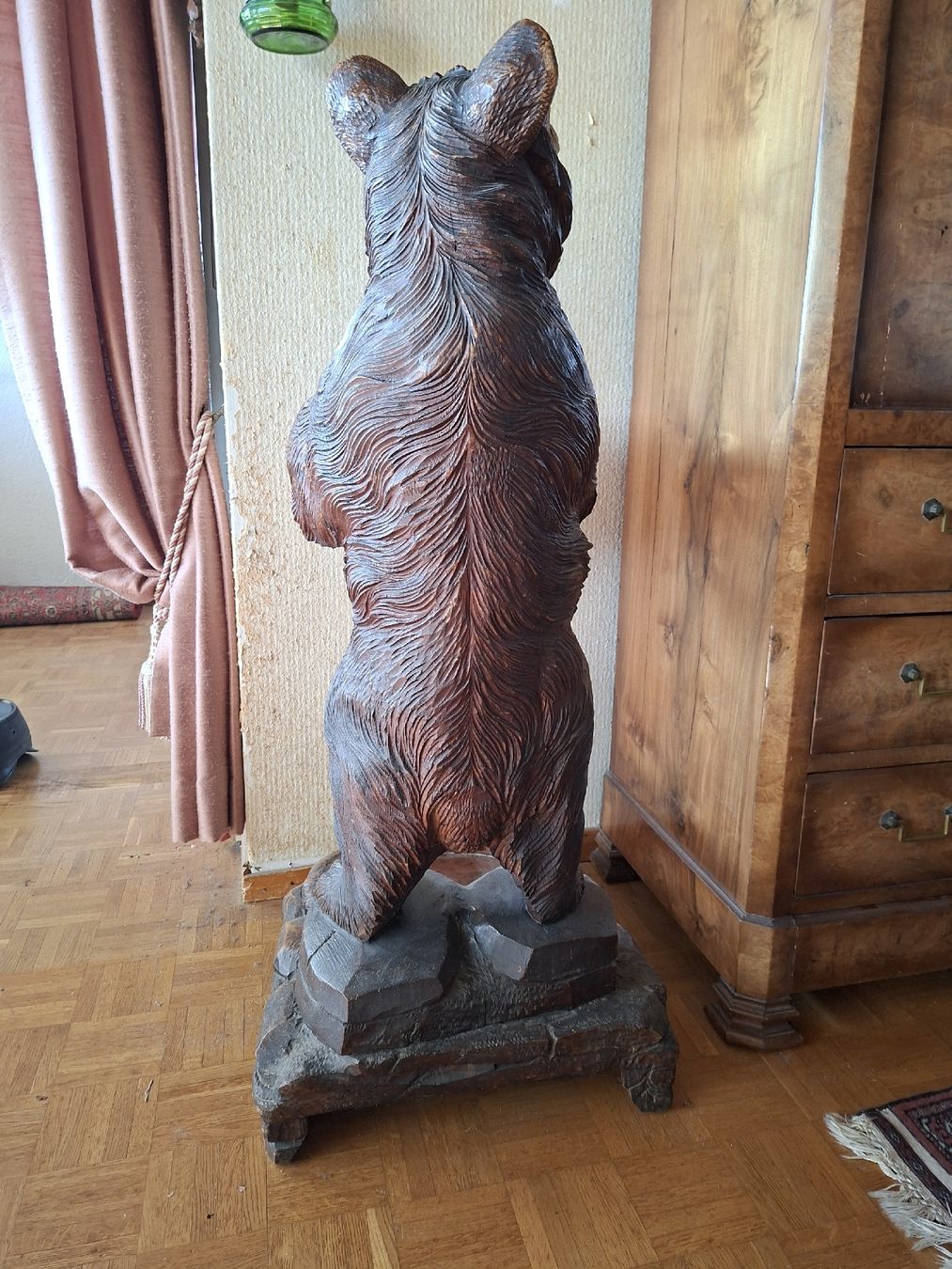Antique wooden bear sculpture