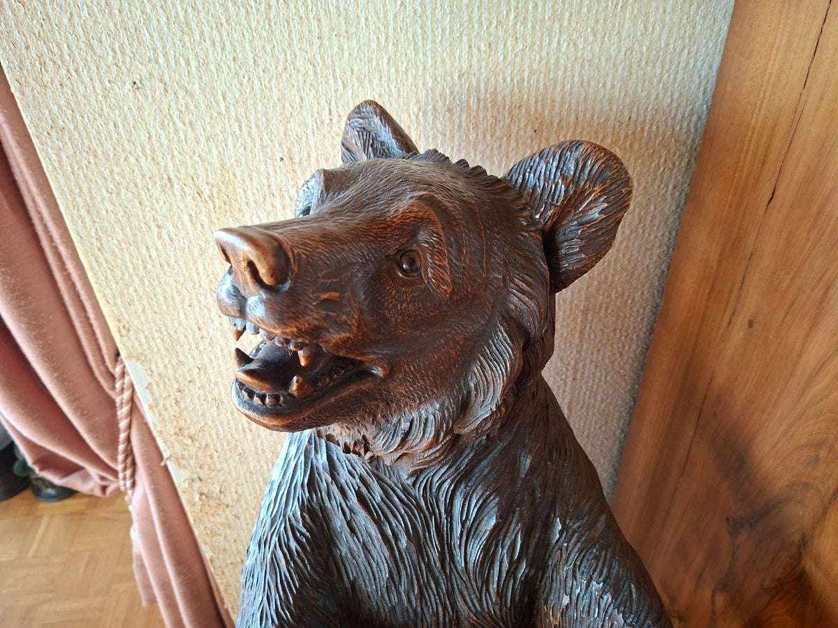 Antique wooden bear sculpture