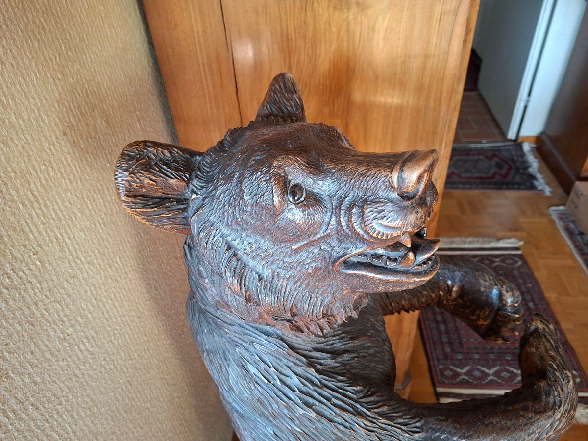 Antique wooden bear sculpture