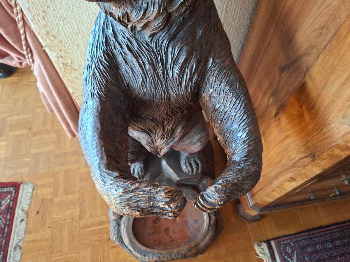 Antique wooden bear sculpture