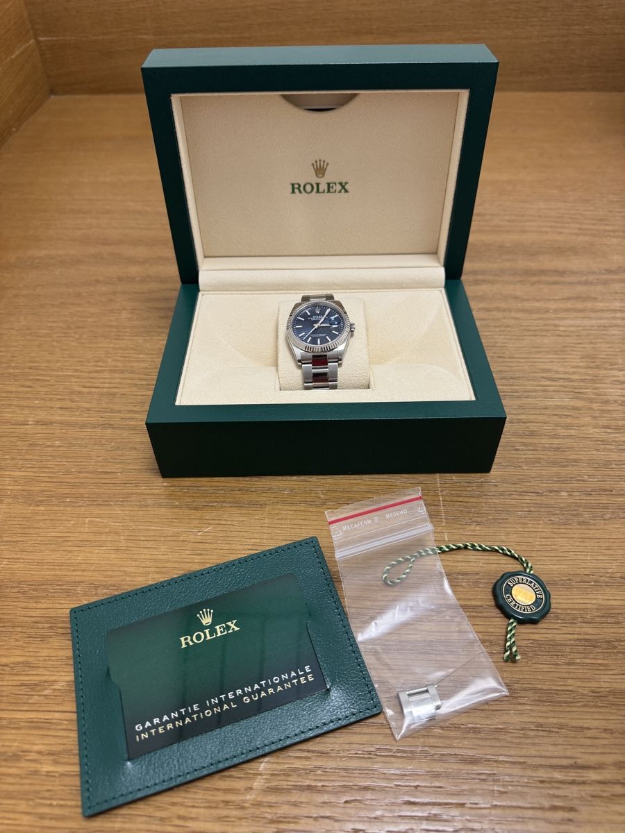 Rolex Datejust 36 126234 with blue fluted motif dial and Oyster bracelet