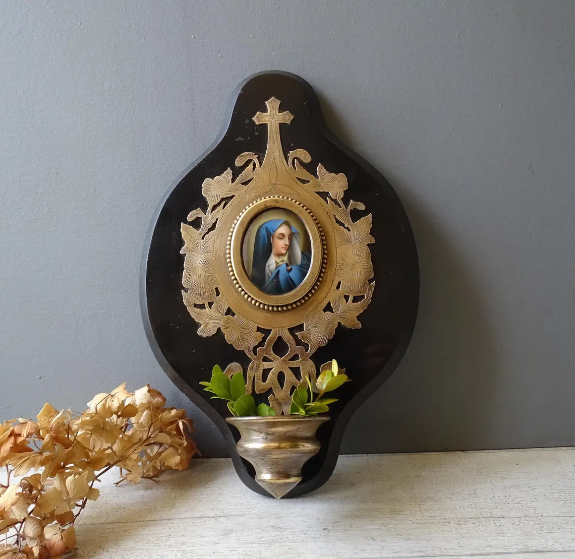 Large antique marbled bronze holy water stoup with a hand-painted porcelain Virgin Mary medallion, enameled stoup.