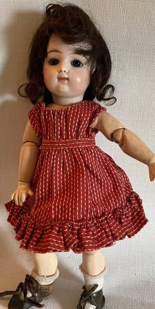 Antique small doll