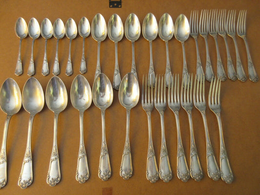 30 solid silver Minerva cutlery pieces; finely crafted and monogrammed