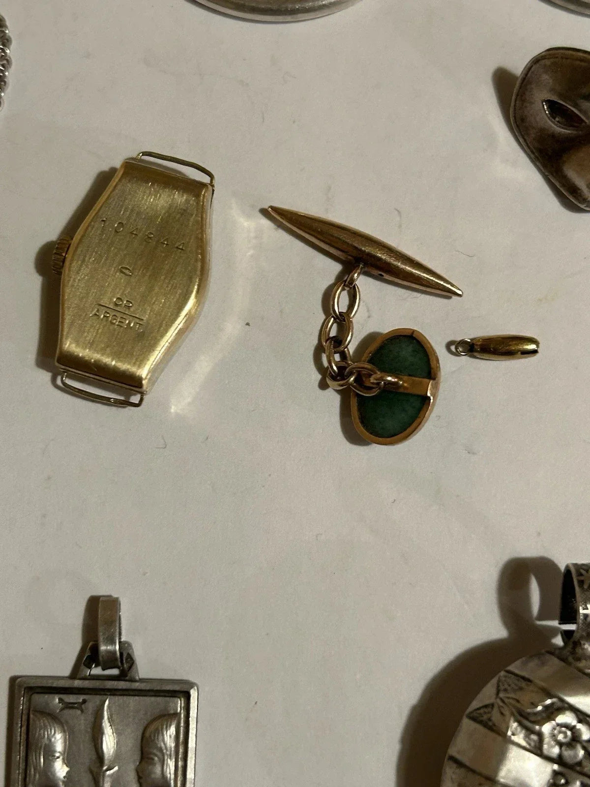 Lots of antique 18k gold and solid silver jewelry