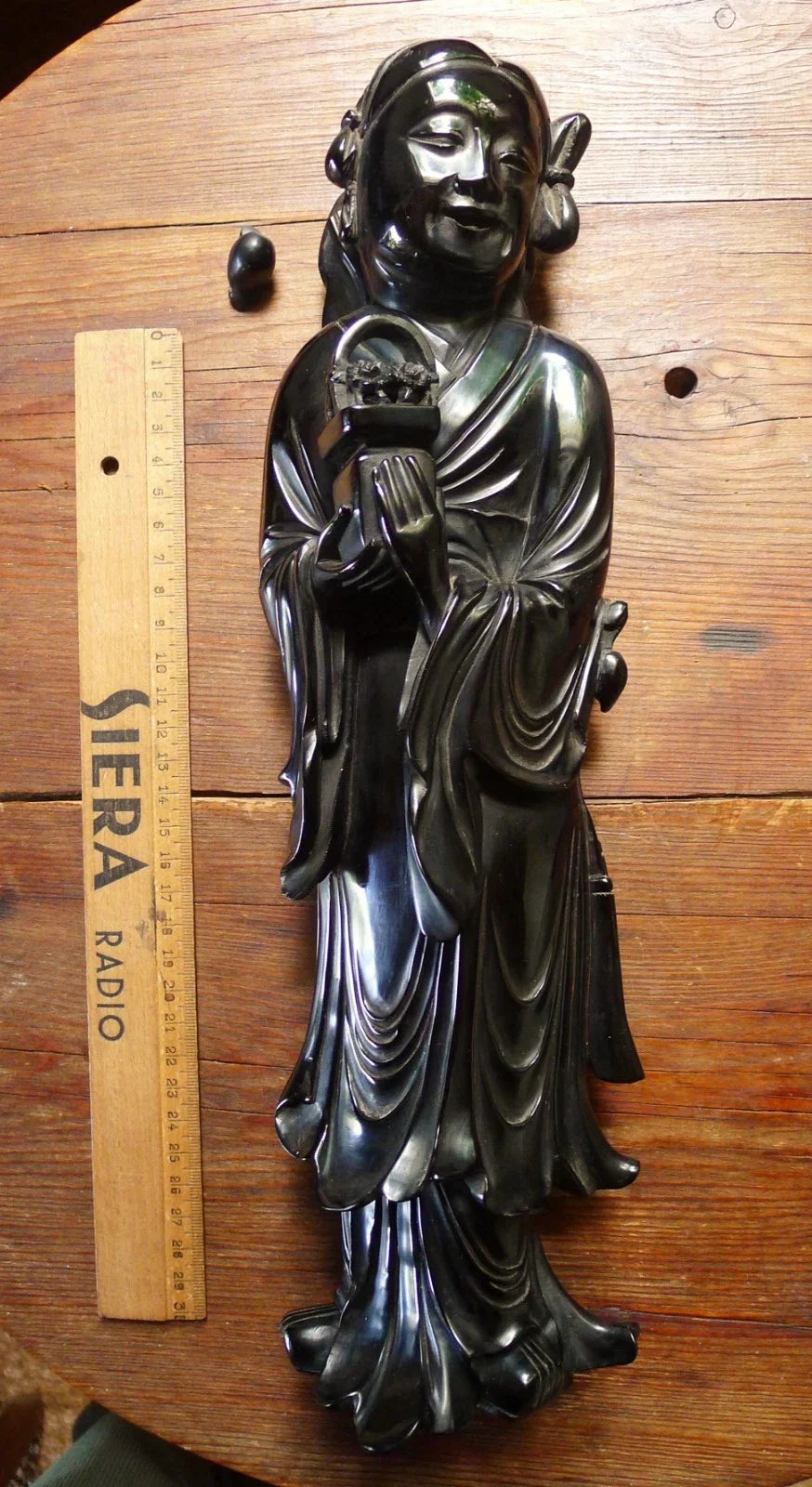Antique cherry red bakelite statue from the early to mid-20th century