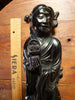 Antique cherry red bakelite statue from the early to mid-20th century