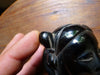 Antique cherry red bakelite statue from the early to mid-20th century