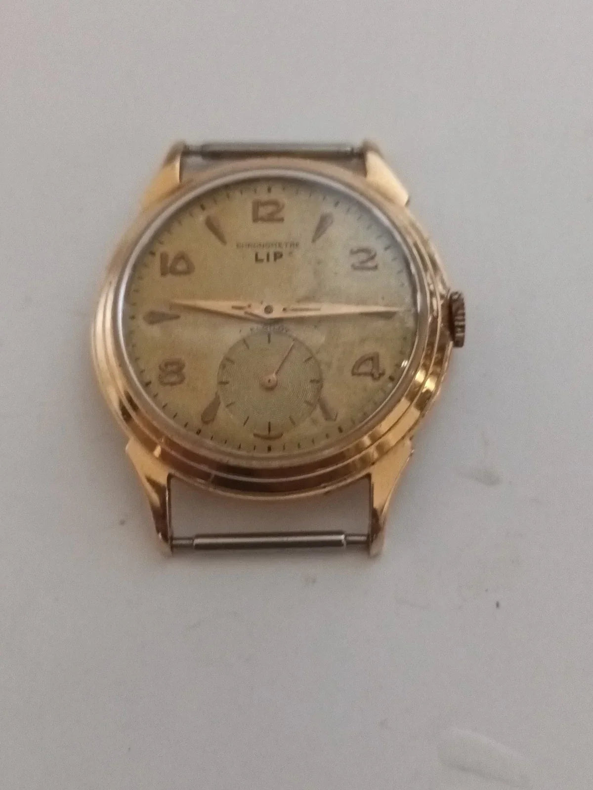 LIP MECHANICAL WATCH IN GOLD, EAGLE'S HEAD HALLMARK