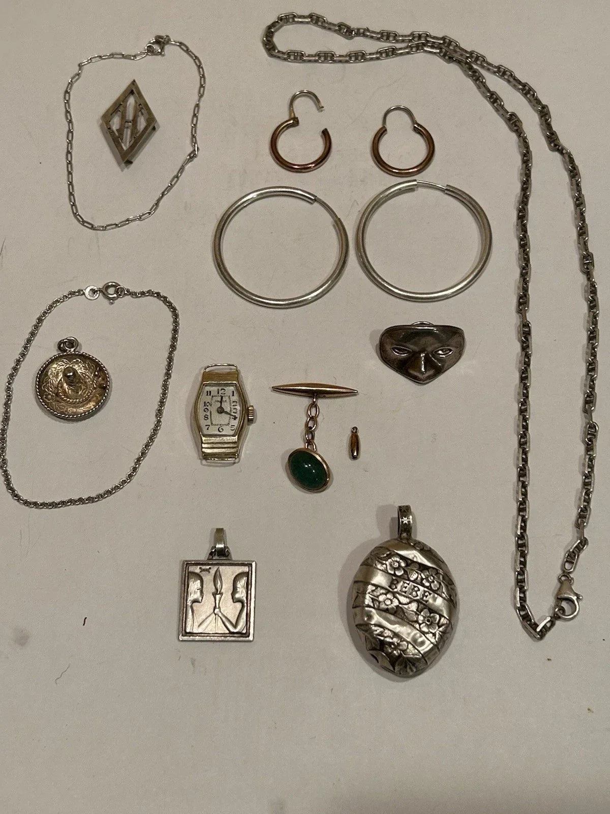 Lots of antique 18k gold and solid silver jewelry