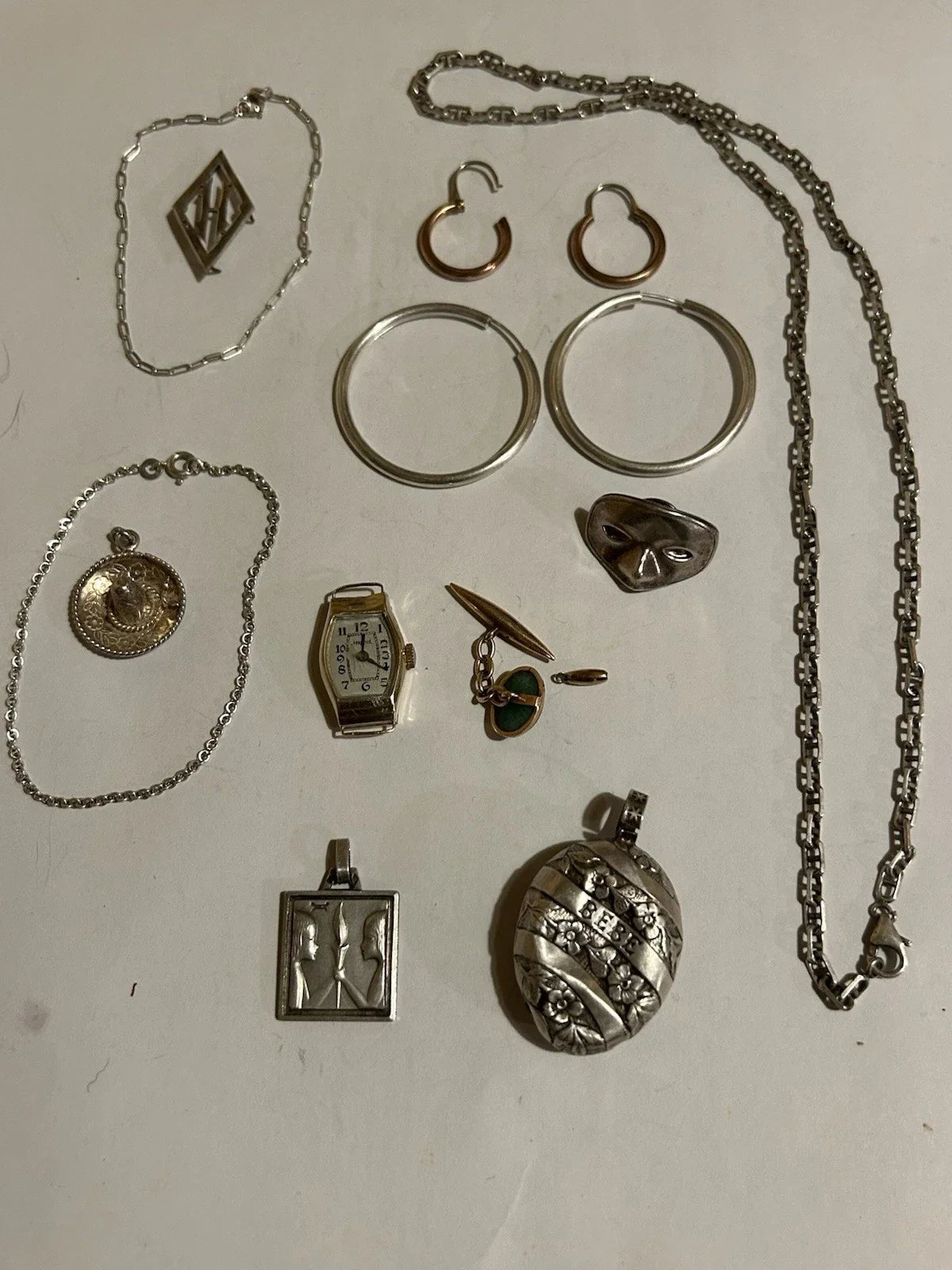 Lots of antique 18k gold and solid silver jewelry