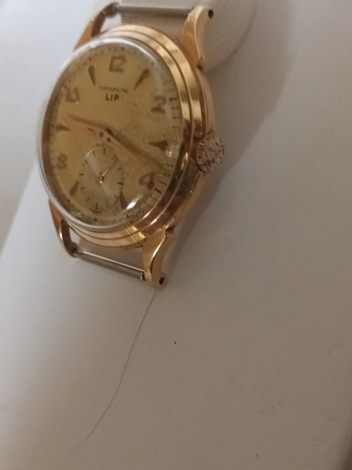 LIP MECHANICAL WATCH IN GOLD, EAGLE'S HEAD HALLMARK