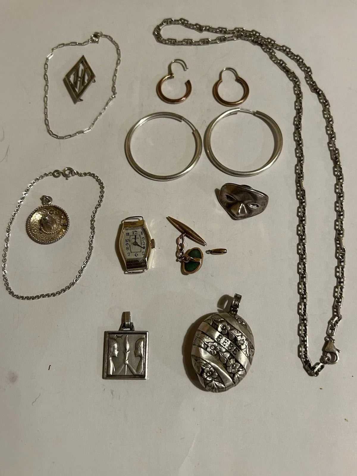 Lots of antique 18k gold and solid silver jewelry