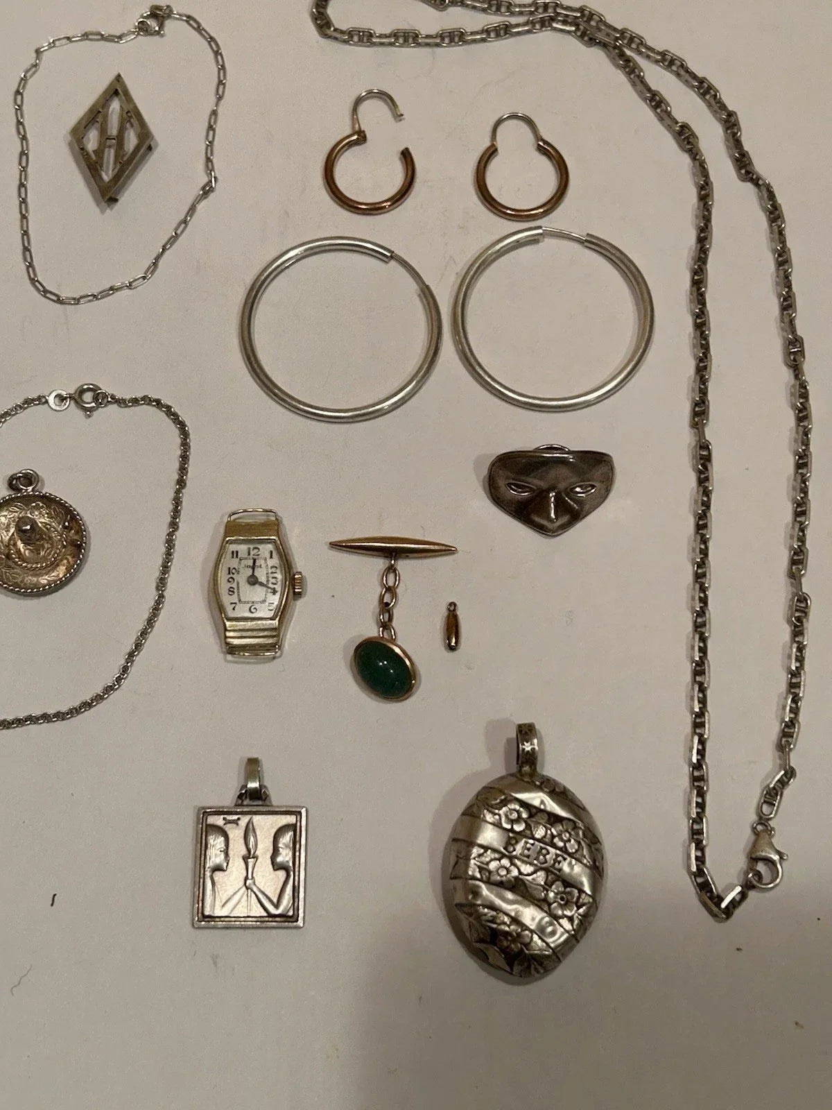 Lots of antique 18k gold and solid silver jewelry