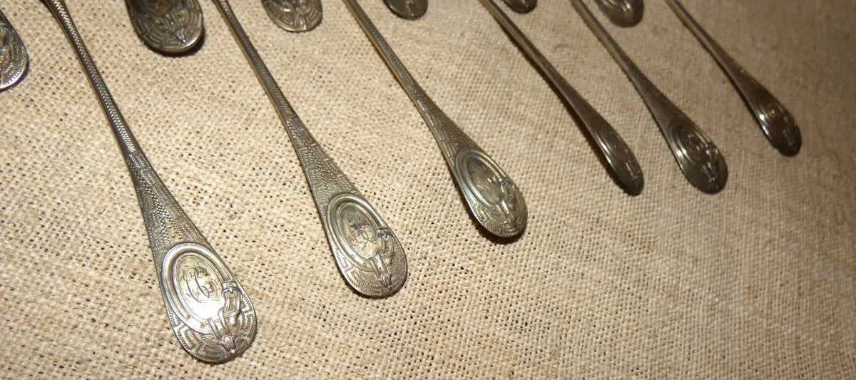 12 antique solid silver teaspoons and sugar tongs