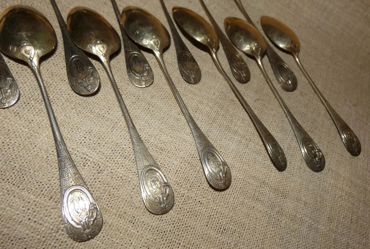 12 antique solid silver teaspoons and sugar tongs