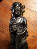 Antique cherry red bakelite statue from the early to mid-20th century