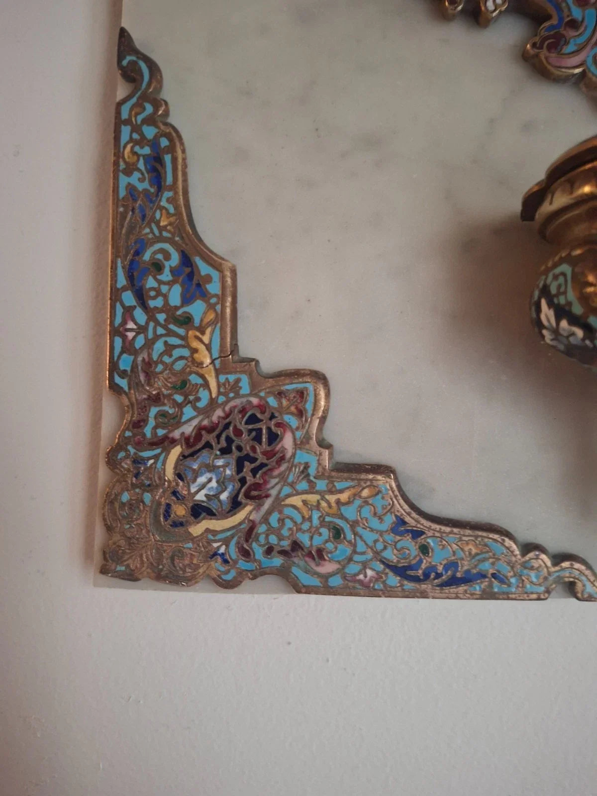 19th-century wall-mounted holy water stoup in marble, gilded bronze, and cloisonné enamel