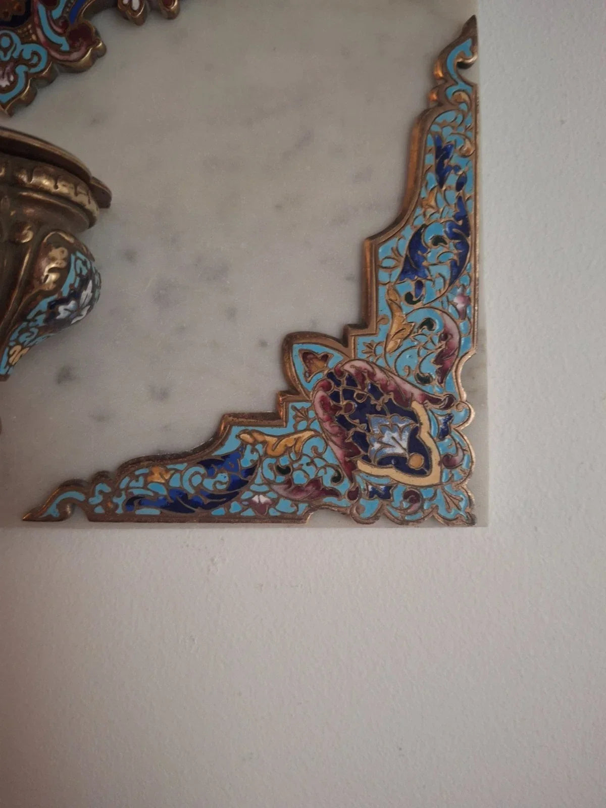 19th-century wall-mounted holy water stoup in marble, gilded bronze, and cloisonné enamel