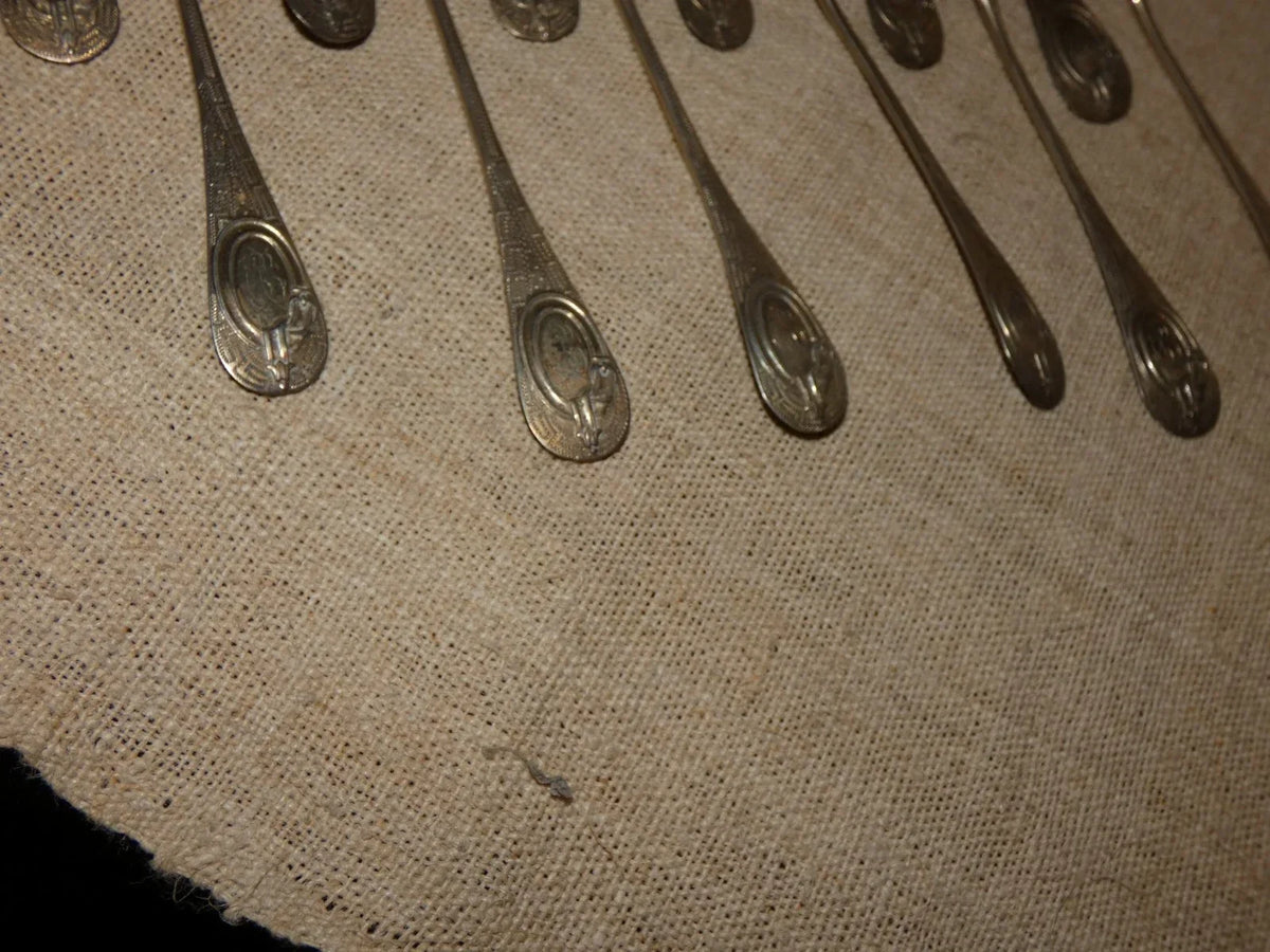 12 antique solid silver teaspoons and sugar tongs