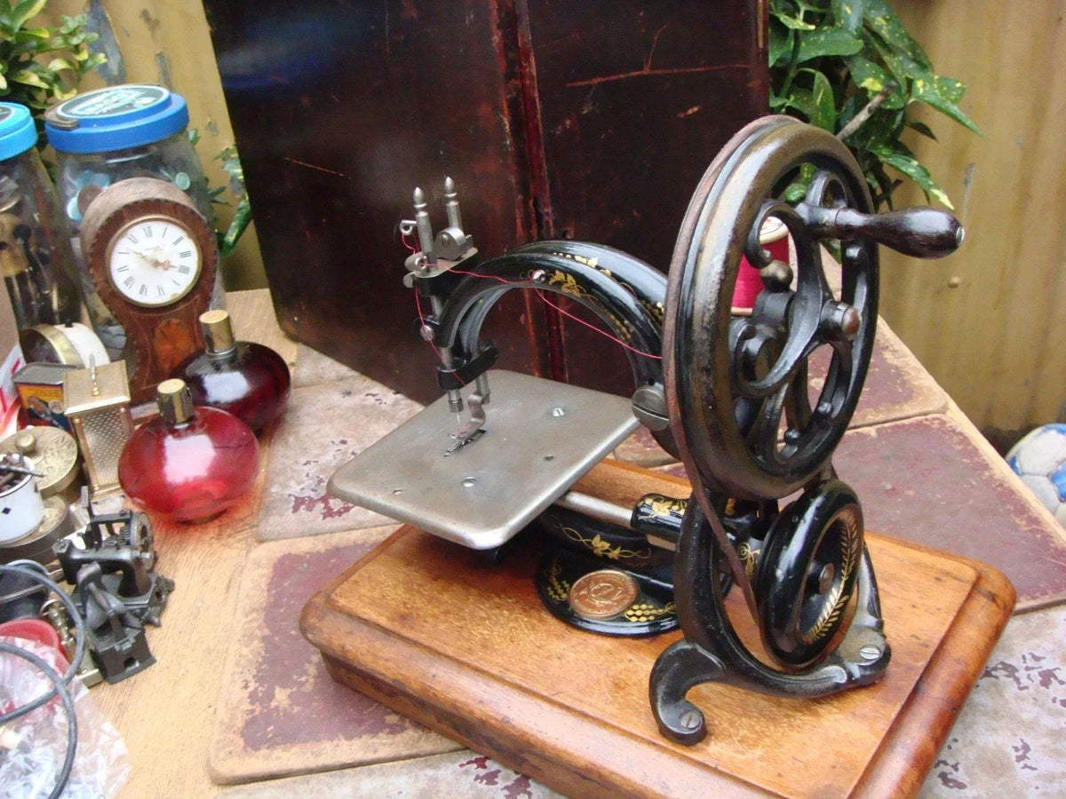 Machine à coudre ancienne et vintage wilcox & gibbs
