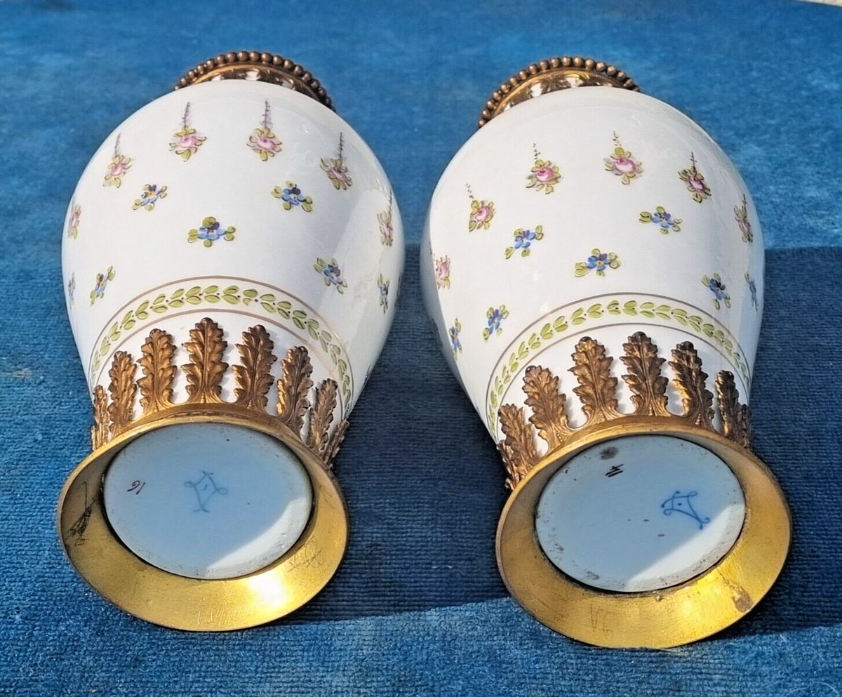 Lovely pair of antique Sèvres porcelain vases with bronze mounts