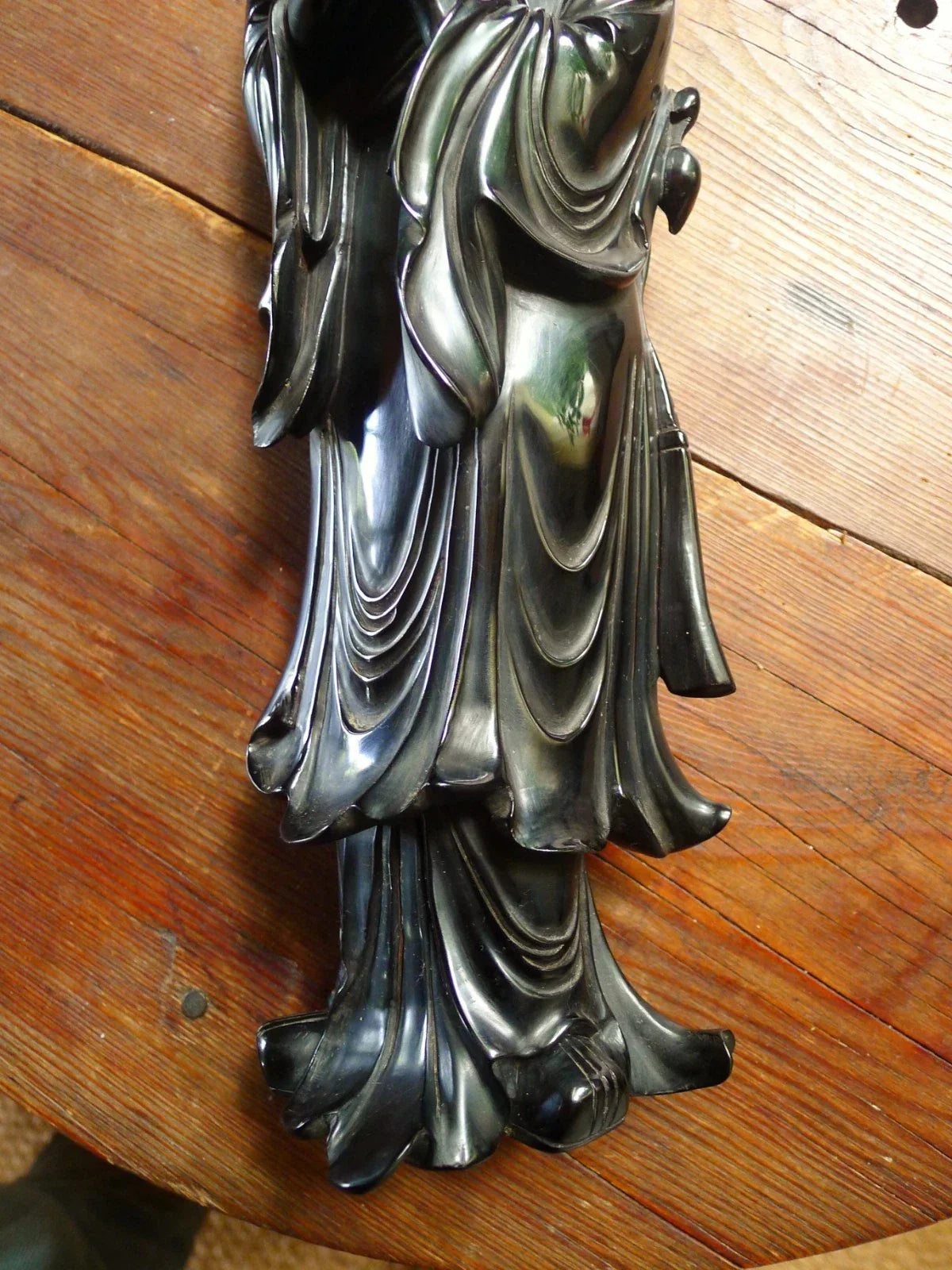 Antique cherry red bakelite statue from the early to mid-20th century
