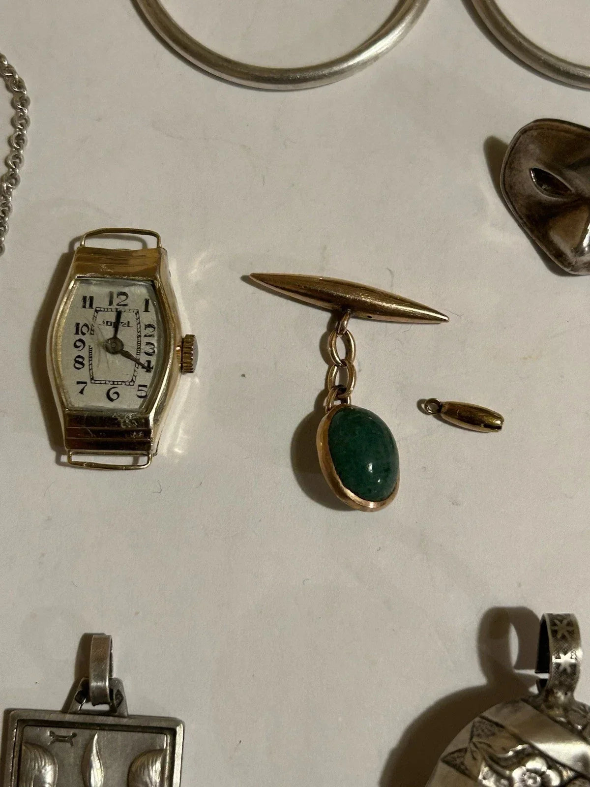 Lots of antique 18k gold and solid silver jewelry
