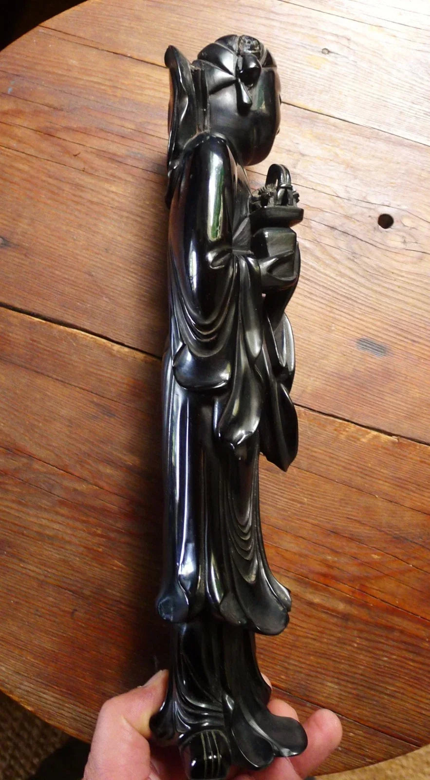 Antique cherry red bakelite statue from the early to mid-20th century