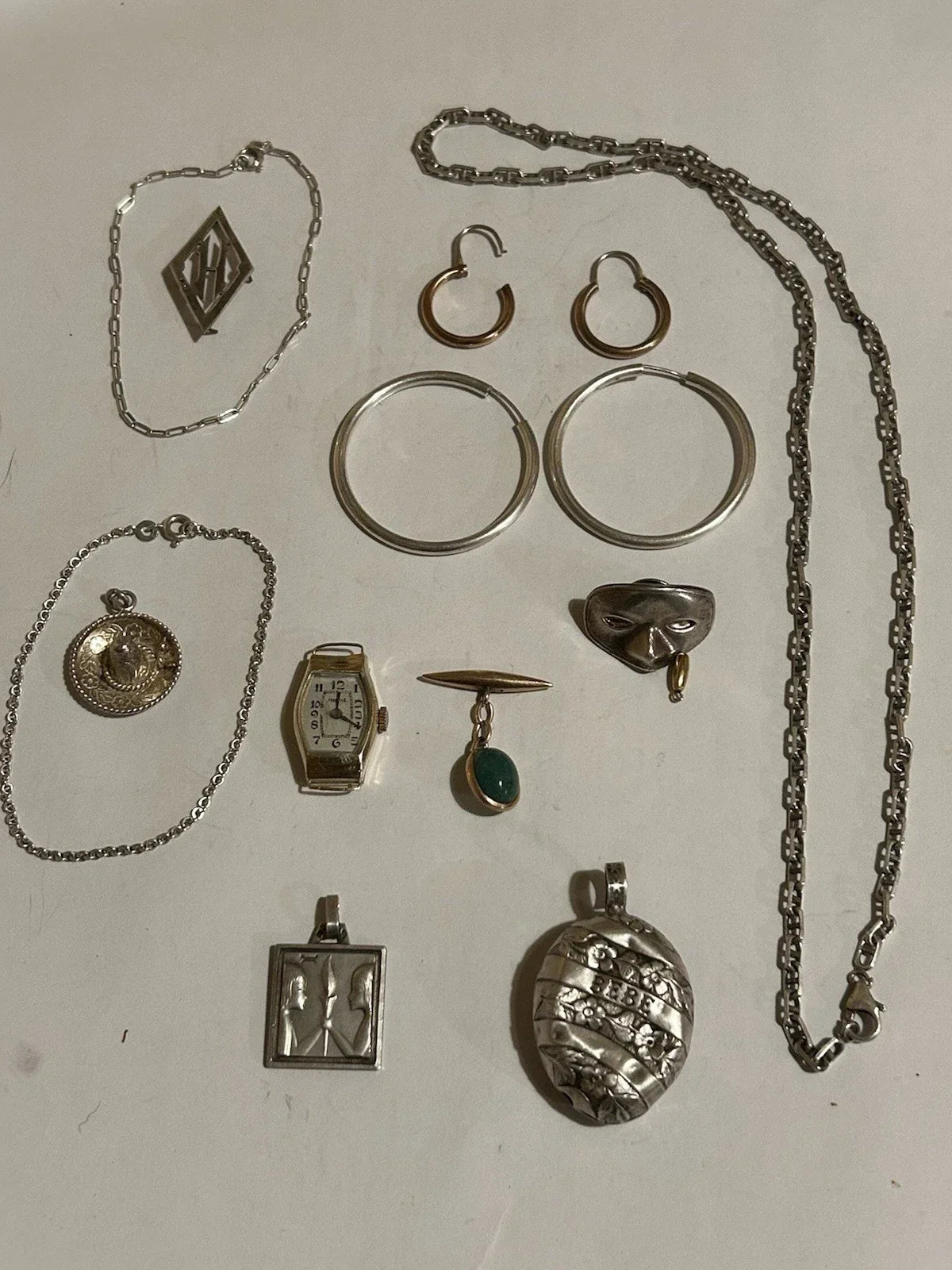 Lots of antique 18k gold and solid silver jewelry